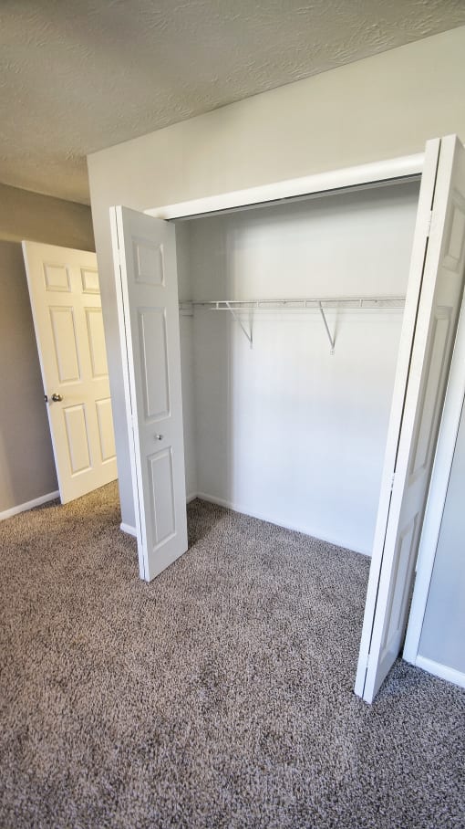 Apartment bedroom closet.