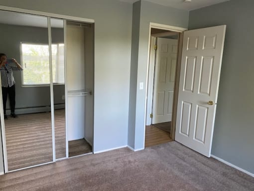 Bedroom with Large Mirror at Integrity Berea Apartments, Integrity Realty LLC, Ohio