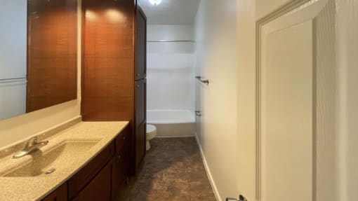 Renovated bathroom in select apartment homes at Woodland Pointe Apartments and Townhomes, Integrity Realty, Ohio, 44240