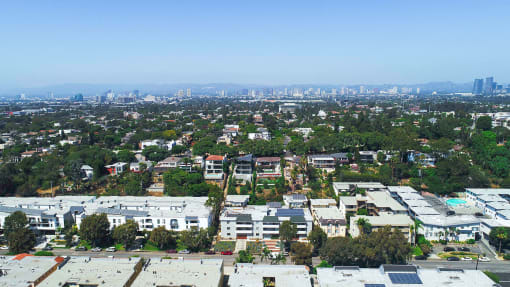 Aerial drone view of Rose North Apartments showing the Palms neighborhood of Los Angeles.
