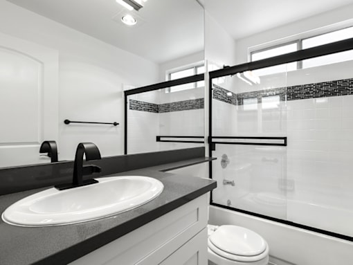 Modern styled bathroom with shower and tub.