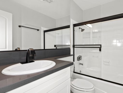 Modern styled bathroom with shower and tub.