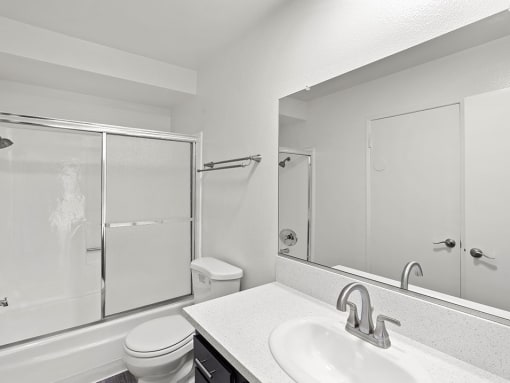 Modern styled bathroom with shower and tub.