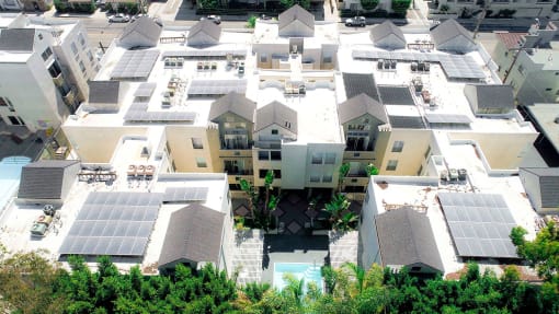 Aerial drone image of Palms Court Apartments.