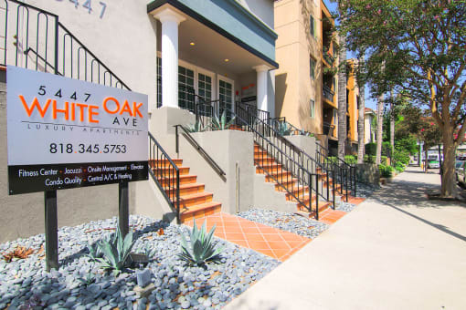 Entrance to Chateau Encino including drought tolerant landscaping.