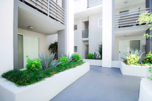 Lushly gardened interior courtyard.