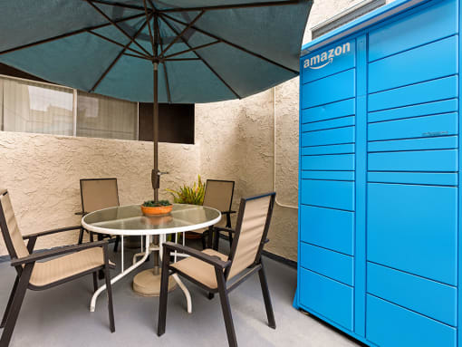 Amazon package delivery lockers and courtyard seating at 1249 South Bundy.