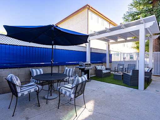 Additional outdoor seating and grilling area.