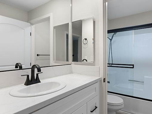 Modern styled bathroom with shower and tub.