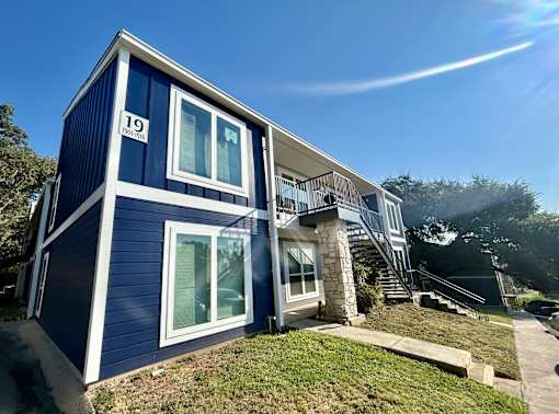 A blue house with the number 19 on it.