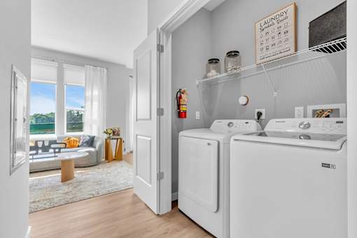 A laundry room with a washer and dryer.