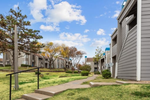 the preserve at ballantyne commons exterior view of apartments with stairs and grass