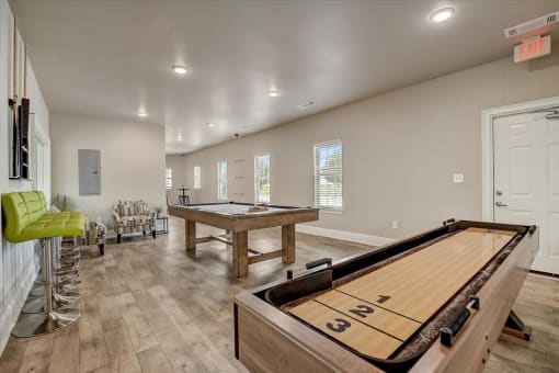 our apartments have a game room with a foosball table and a ping pong table