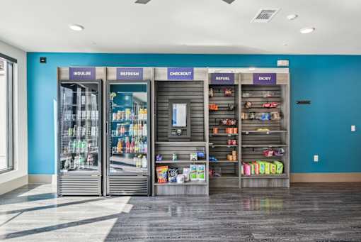A store with a blue wall and a sign that says "refuel" on it.
