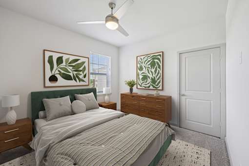 A bedroom with a bed, nightstand, and a ceiling fan.