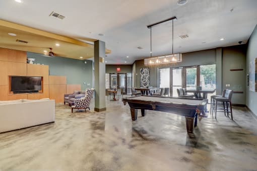the preserve at ballantyne commons community clubhouse with a pool table