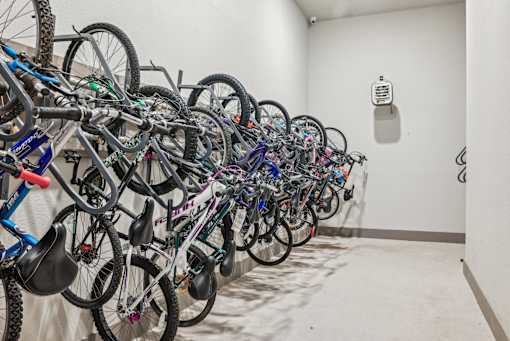 A room full of bicycles is shown.