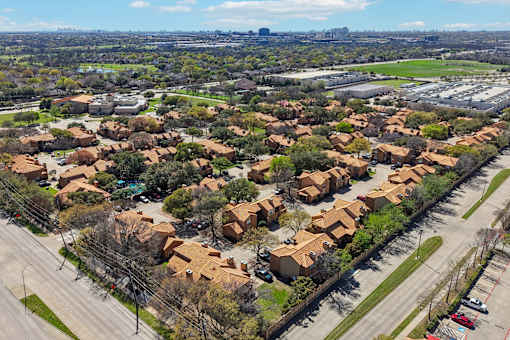 A residential area with houses and roads.
