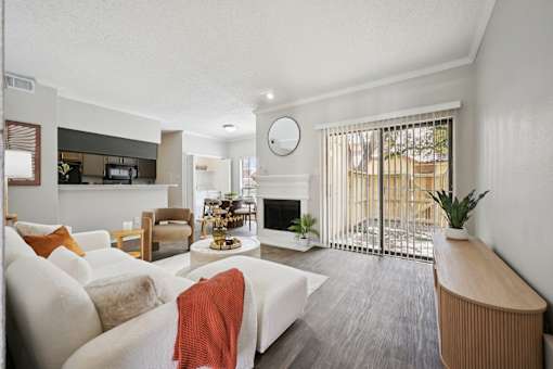 A living room with a fireplace and a couch.