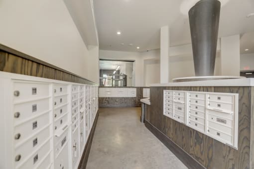 the kitchen has plenty of cabinets and drawers and a large boiler