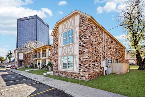 A brick building with a sign that says 29 on it.