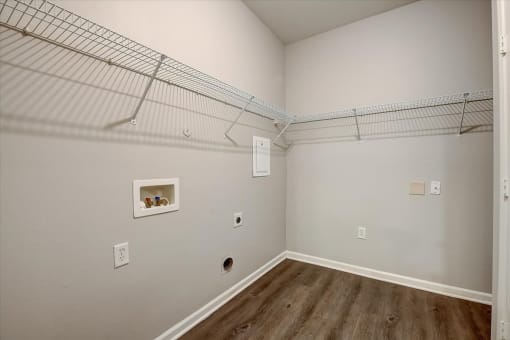 a bedroom with a closet and a wire shelving unit
