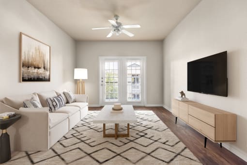 a living room with a white couch and a coffee table