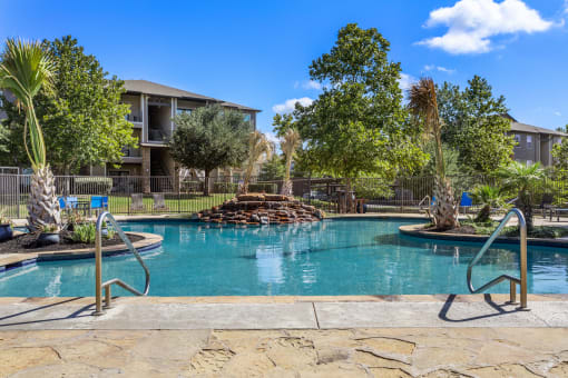 pool at the enclave at woodbridge apartments in sugar land, tx