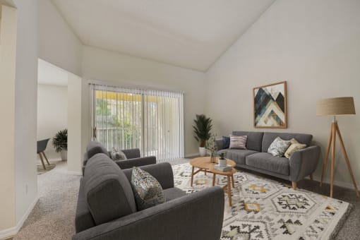 a living room with couches and a coffee table