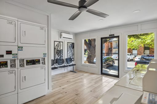 a laundry room with a washer and dryer