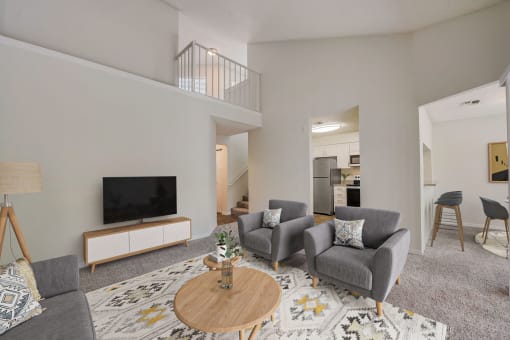 a living room with two couches and a coffee table
