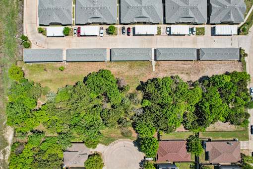 A residential area with houses and trees.