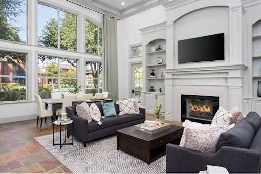 A living room with a fireplace and a couch.