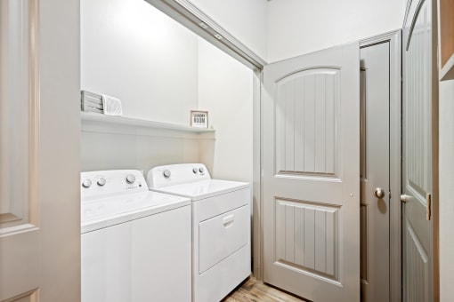 a washer and dryer in a laundry room