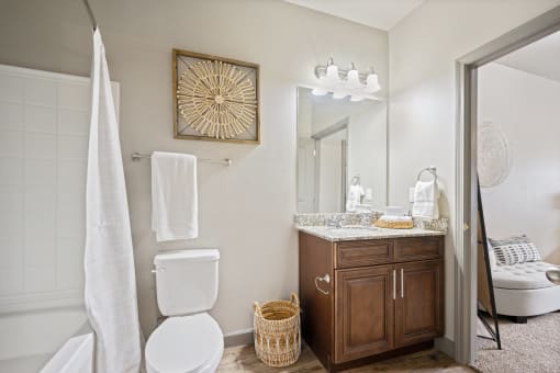 a bathroom with a toilet and a sink