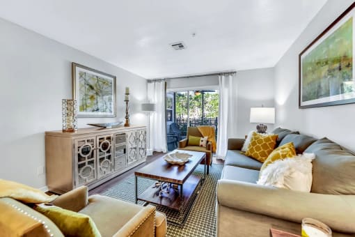 a living room with two couches and a coffee table