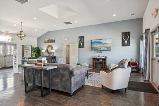 a living room with a couch and a table