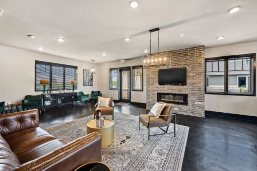 a living room with a fireplace and a television