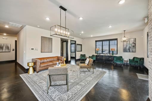 a living room with a leather couch and a coffee table