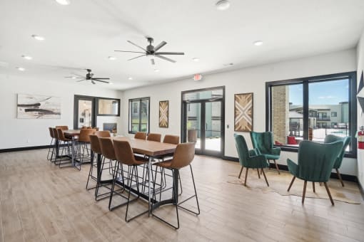 the reserve at city center spacious dining room with table and chairs and windows