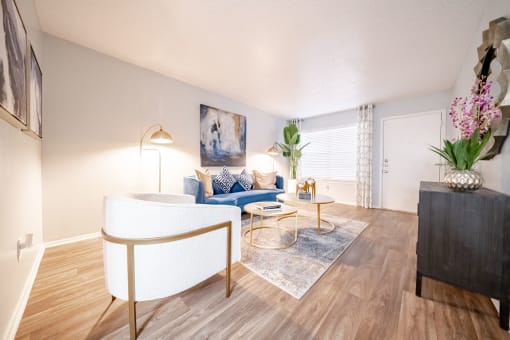 our apartments offer a living room with a couch and a coffee table