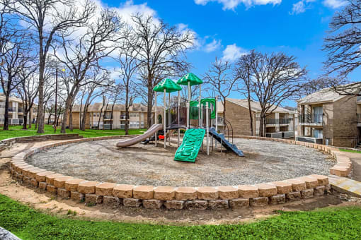 the playground at the preserve at polo terrace apartments  at 1505 Exchange Apartments, Fort Worth, TX, 76112