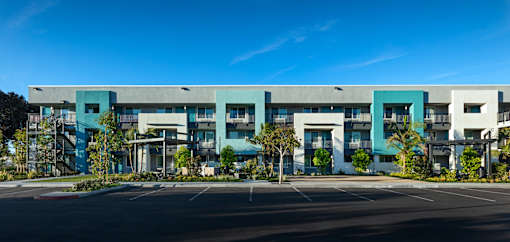 A modern building with a blue and white facade.