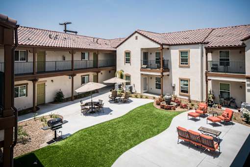 A sunny day at the courtyard of apartment buildings.