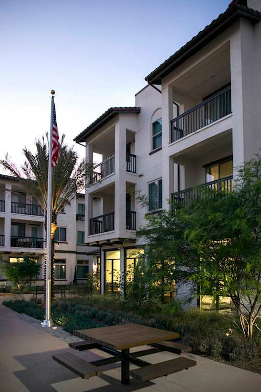 A building with a flag on top of it.
