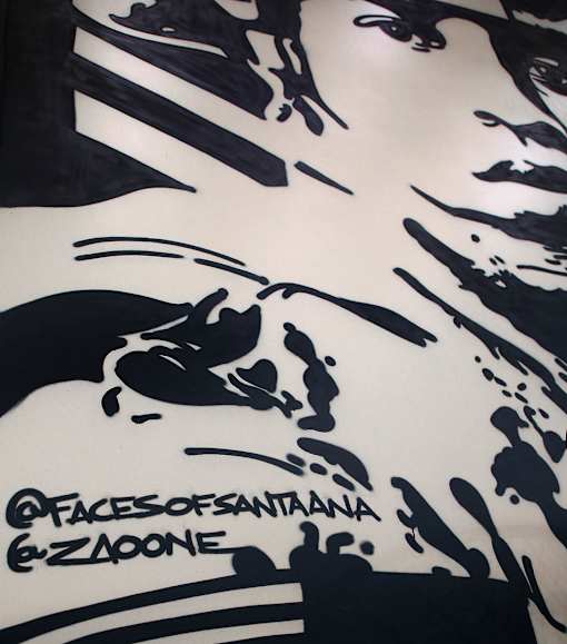 A black and white abstract painting with the text "@facesofsantana & @zazooned" at the bottom.