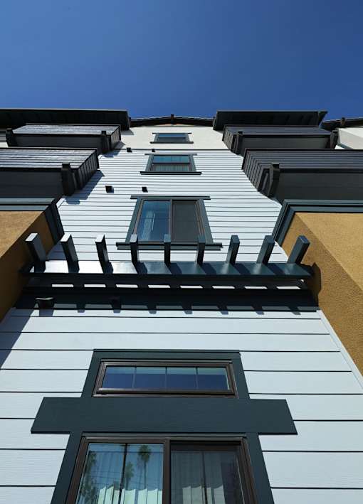 A building with a blue sky in the background.