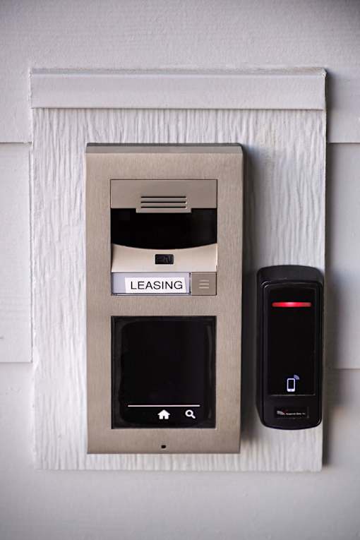 A leasing box with a keypad and a remote.