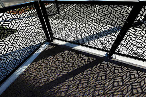 A black and white geometric patterned wall.