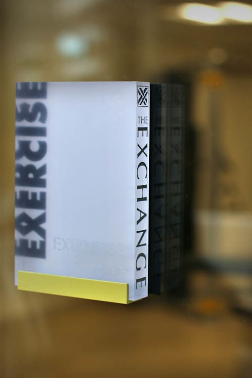 A book with the title "The Exercise Exchange" is displayed.